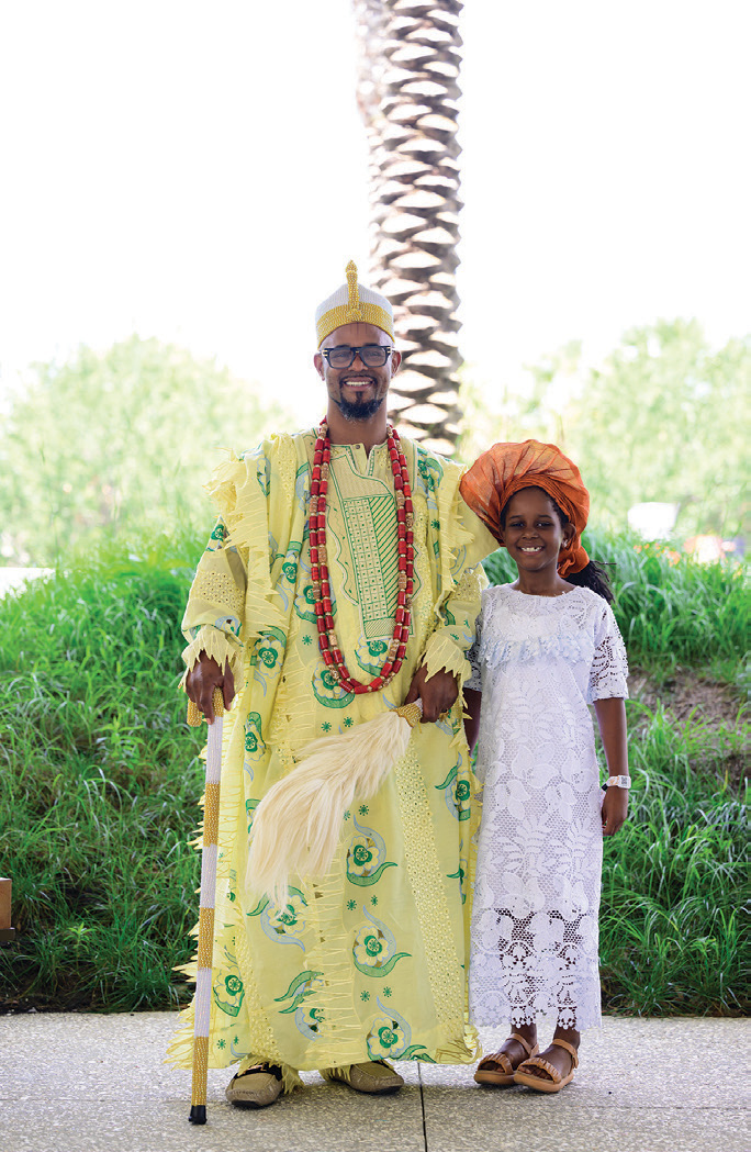 Father and Daughter dressed in cultural outfits