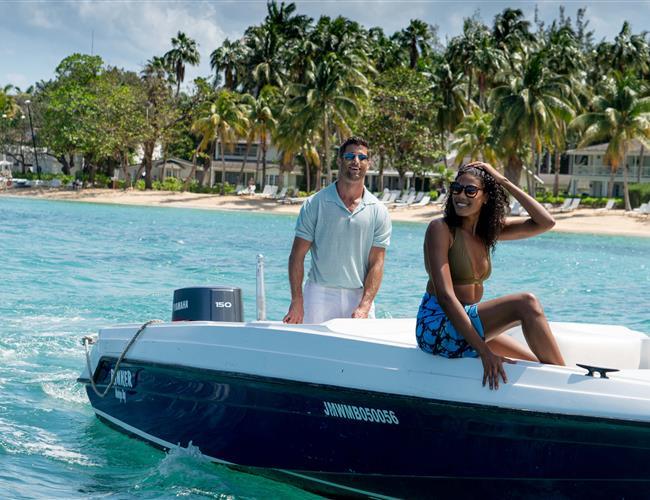 A couple on a speed boat