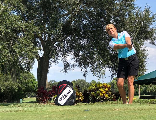 Female golf instructor