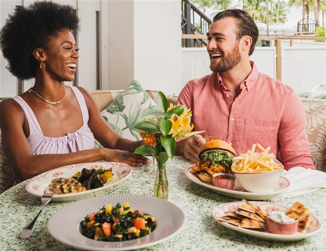 Two people enjoying a meal together