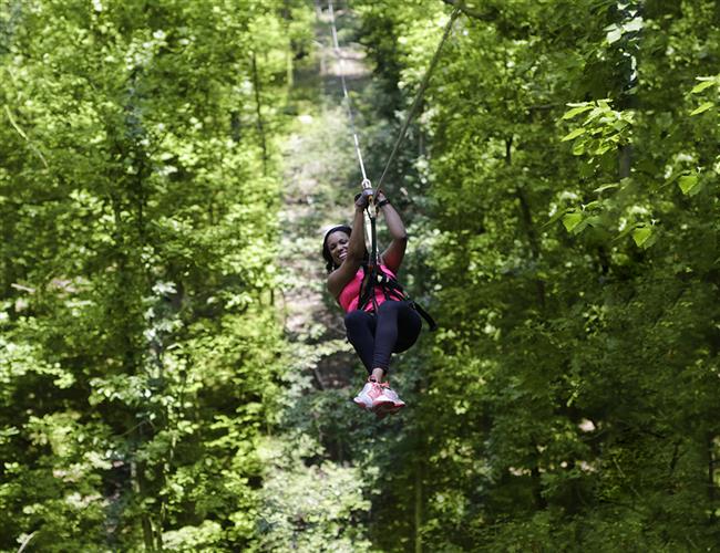 A woman ziplining