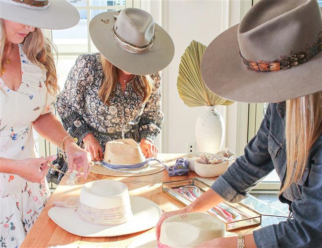 Three women making hats at Marsh & Magnolia