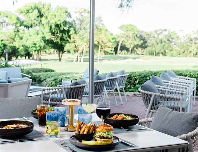 Packard's patio dining overlooking the golf course