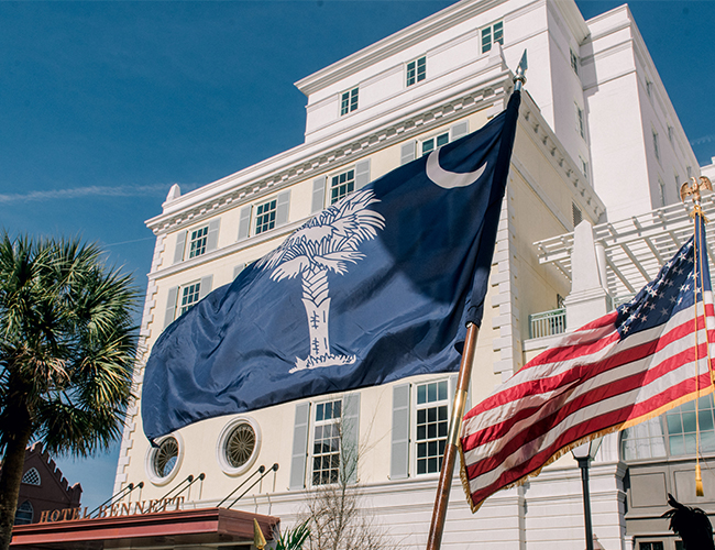 US and Charleston Flags in front of Hotel Bennett