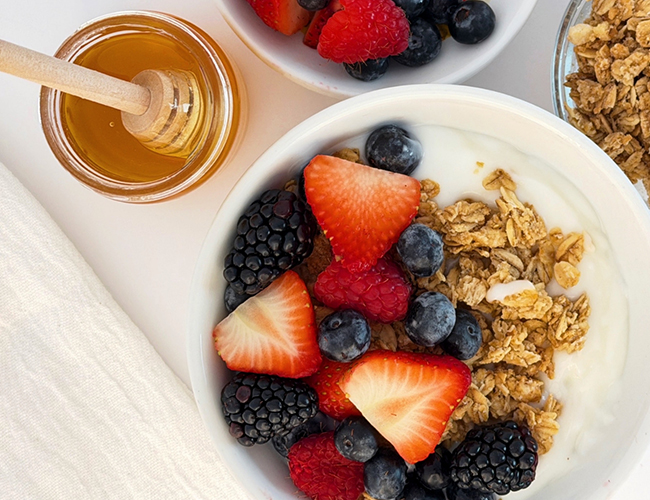 natural honey with fruit bowl