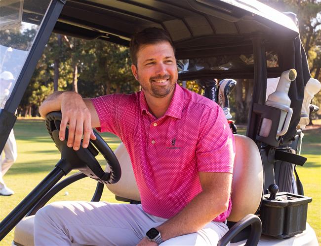 Golfer in a golf cart