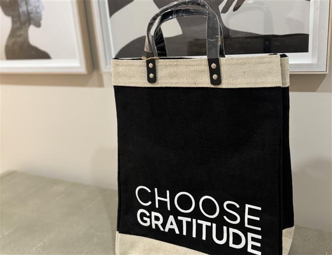 A tote bag at Salamander Spa with the words choose gratitude 
