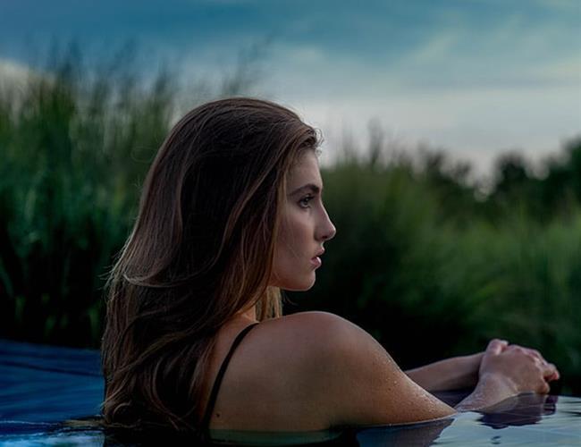 woman in spa pool relaxing