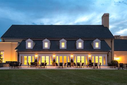 An exterior shot of a building at Middleburg with a lot of lights
