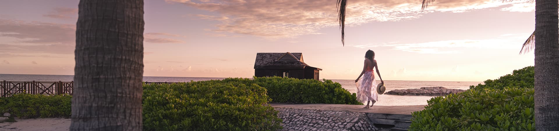 Woman walking on the beach at Half Moon