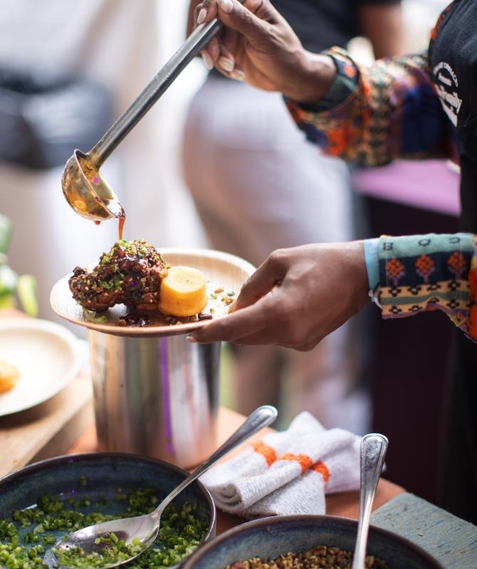 Someone making a plate of food