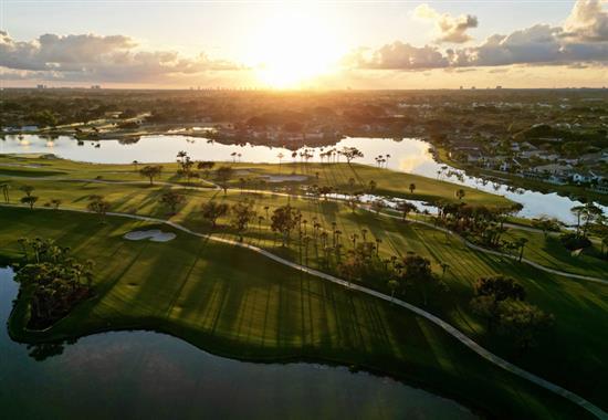 aerial view of golf course at sunset