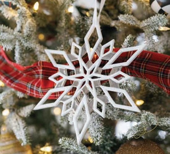 snowflake ornament on tree