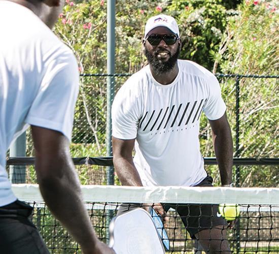 men playing pickleball