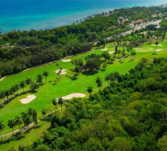 Aerial view of golf course near ocean