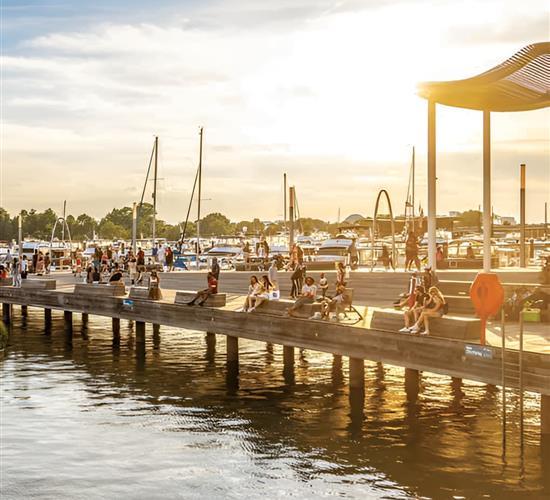 people on the docks by the water