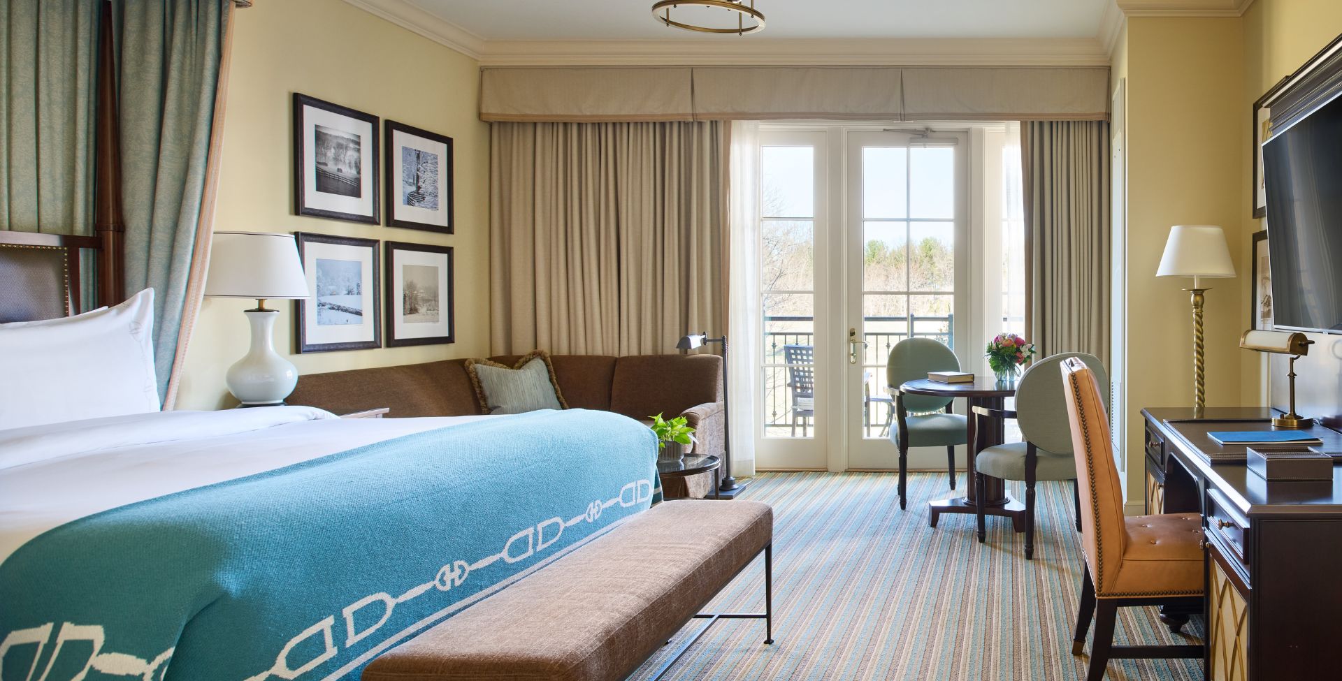 Middleburg room with fireplace, tv, and balcony