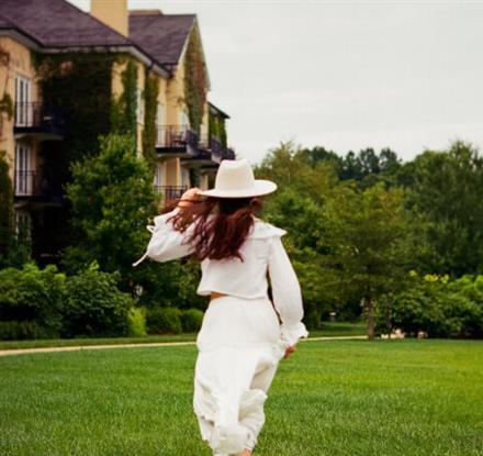 Woman in white outfit