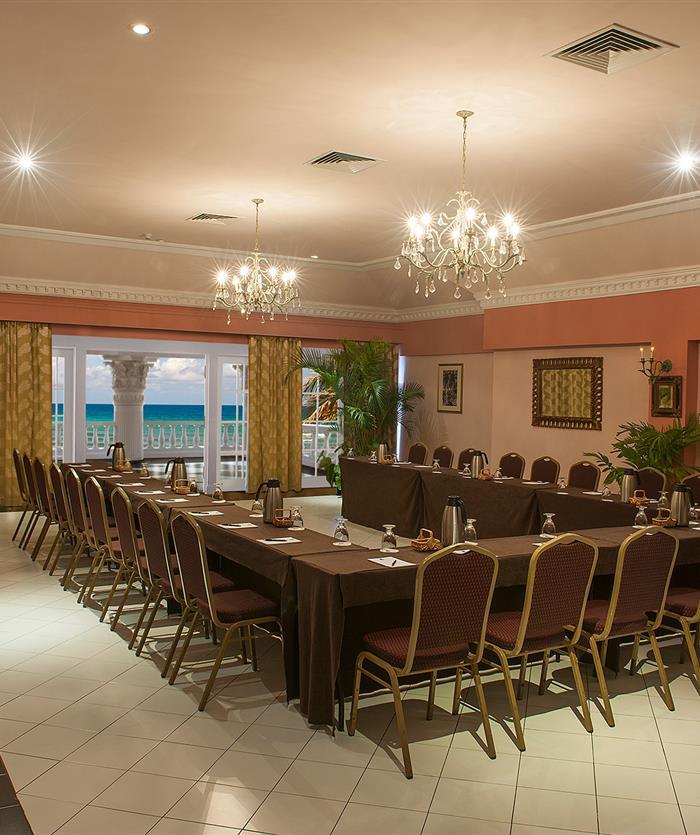 A meeting room with lots of chairs