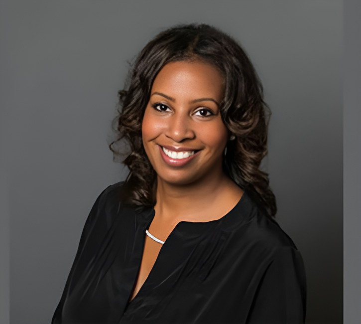 A woman smiling for a photo