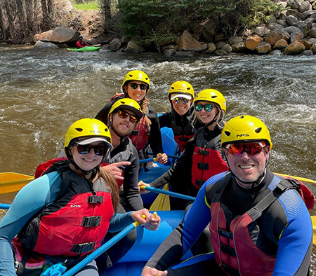 Darren with team whitewater rafting