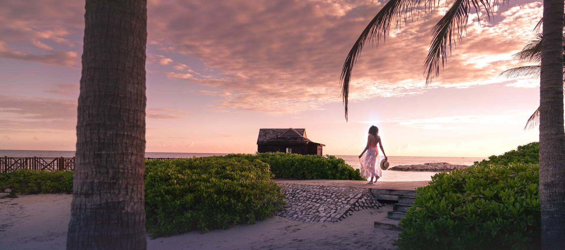 woman on beach at dusk