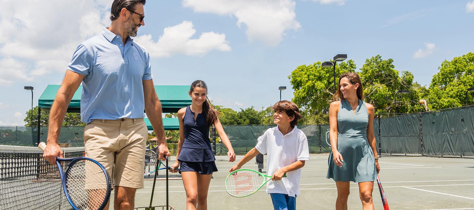  A family of four on tennis court