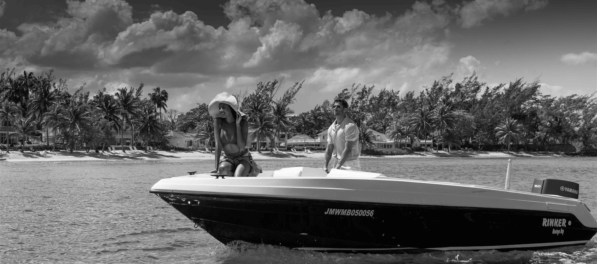 A couple on speed boat at Half Moon